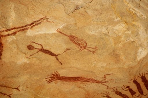 Recorded panel: red figures on yellow sandstone